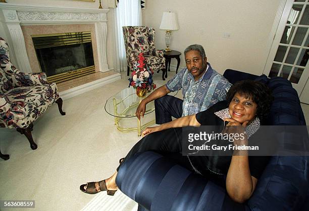 Earvin Johnson, Sr. And his wife Christine in one of the sitting areas/living room type areas of their Lansing, Michigan home. They are the parents...