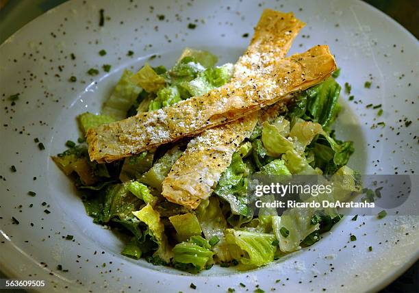 Digital photo taken on Thursday, 4/29/2004, Malibu, CA  Geoffrey's Caesar Salad with shaved Parmesan, classic Caesar dressing and Filo crisp,...