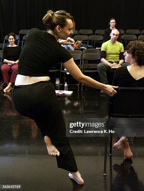 Workshop imported to LA to help emerging choreographers. Pic. Shows dancers Arianne MacBean and Robin Conrad performing for fellow dancers and...