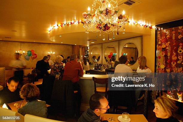 The revamped Vida Nueva restaurant in the Los Feliz area. Pic. Shows the interior of the place with diners.