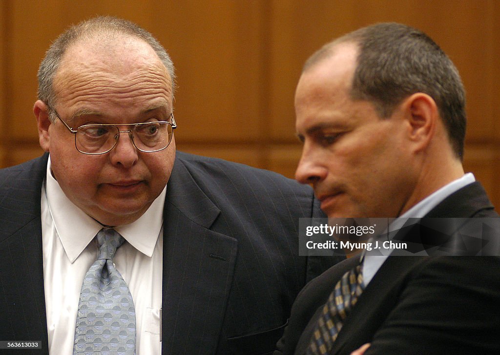 UCLA attorney Louis Marlin (left) and plaintiffs' attorney Ray Boucher agreed to a preliminary injun
