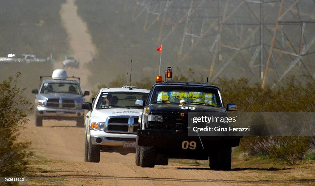 With official race vehicles following closely behind, The Golem Group's vehicle, Golem I, approaches