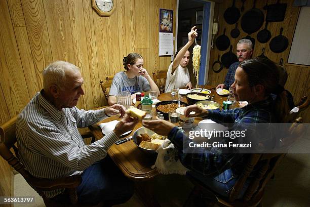 Howard Blair joins his son's family for dinner every night at the ranch. From the left, Howard, Lacy Emily Rob, Cody and Kate.