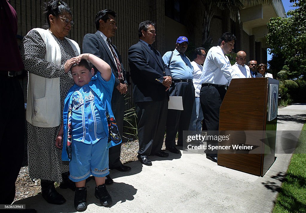 Etelvina Menchaca (cq)(cq) with her grandson Carlos Diosdado,5, left, during press conference by Lea