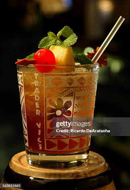 Polynesianinspired, but LAborn, Mai Tai cocktail, served at Trader Vic's. Trader Vic's Mai Tai mix, Lime Juice, Light and Dark Rum, garnished with...