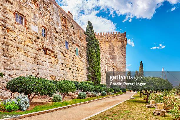 roman city walls,tarragona - tarragona stock pictures, royalty-free photos & images