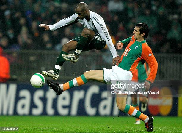 Johan Micoud of Werder tussels for the ball with Flavio Conceicao of Athens during the UEFA Champions League Group C match between Werder Bremen and...