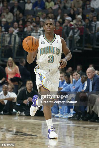 Chris Paul of the New Orleans/Oklahoma City Hornets brings the ball upcourt during the game against the Denver Nuggets at the Ford Center on November...