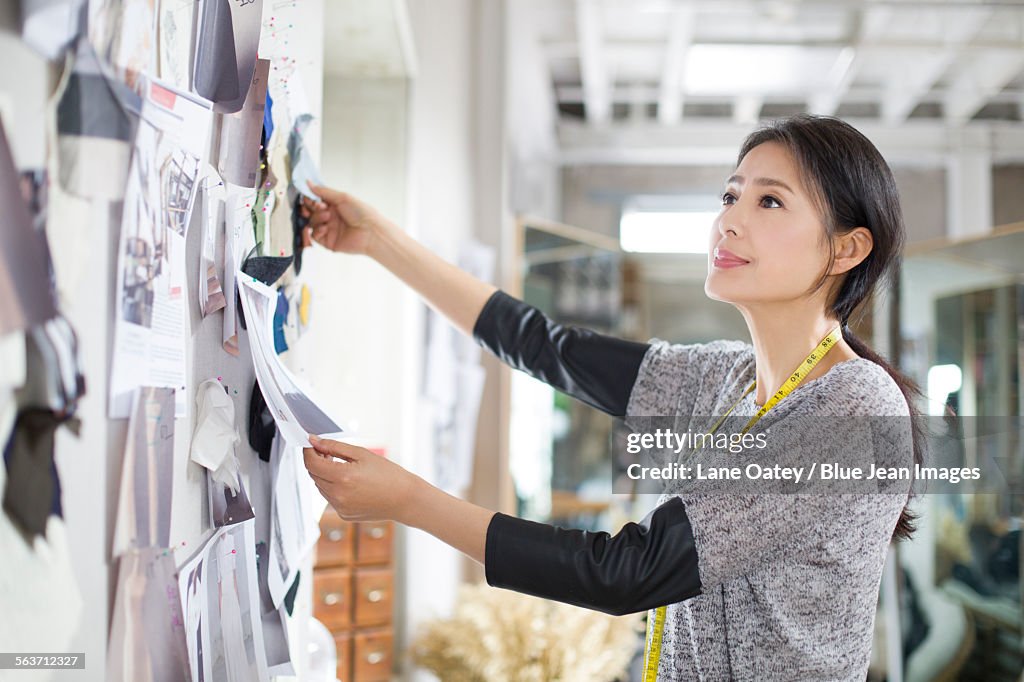 Fashion designer working in studio