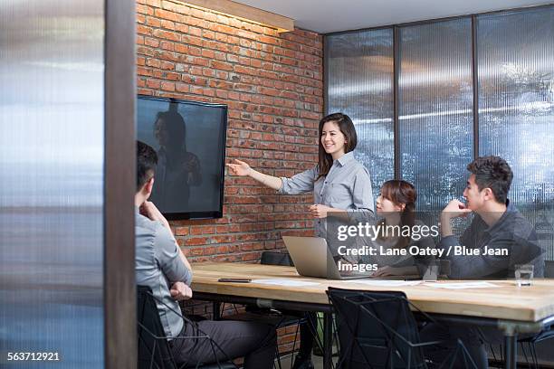 business people having meeting in board room - liquid crystal display stock pictures, royalty-free photos & images