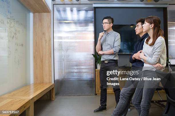 business people having a meeting in board room - liquid crystal display stock pictures, royalty-free photos & images