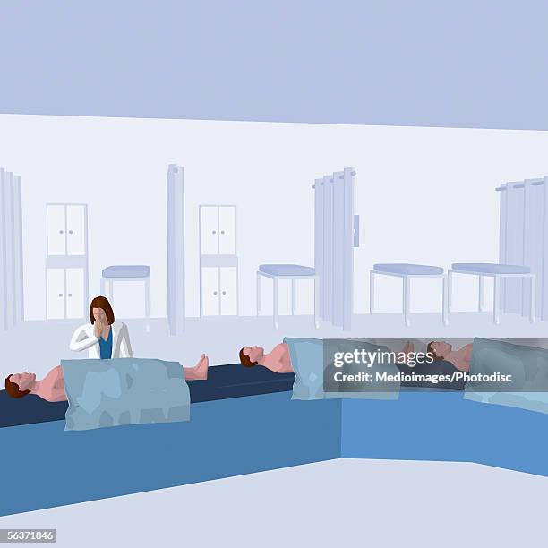 doctor examining patients on a conveyor belt - patient lying on back stock illustrations