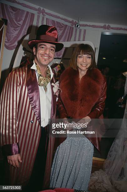 British fashion designer John Galliano and English editor-in-chief of American Vogue, Anna Wintour, attend a party at Bergdorf Goodman, New York...