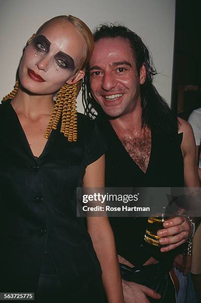 American fashion model, Amber Valletta, and British fashion designer, John Galliano, at the Galliano fashion show, circa 1995.