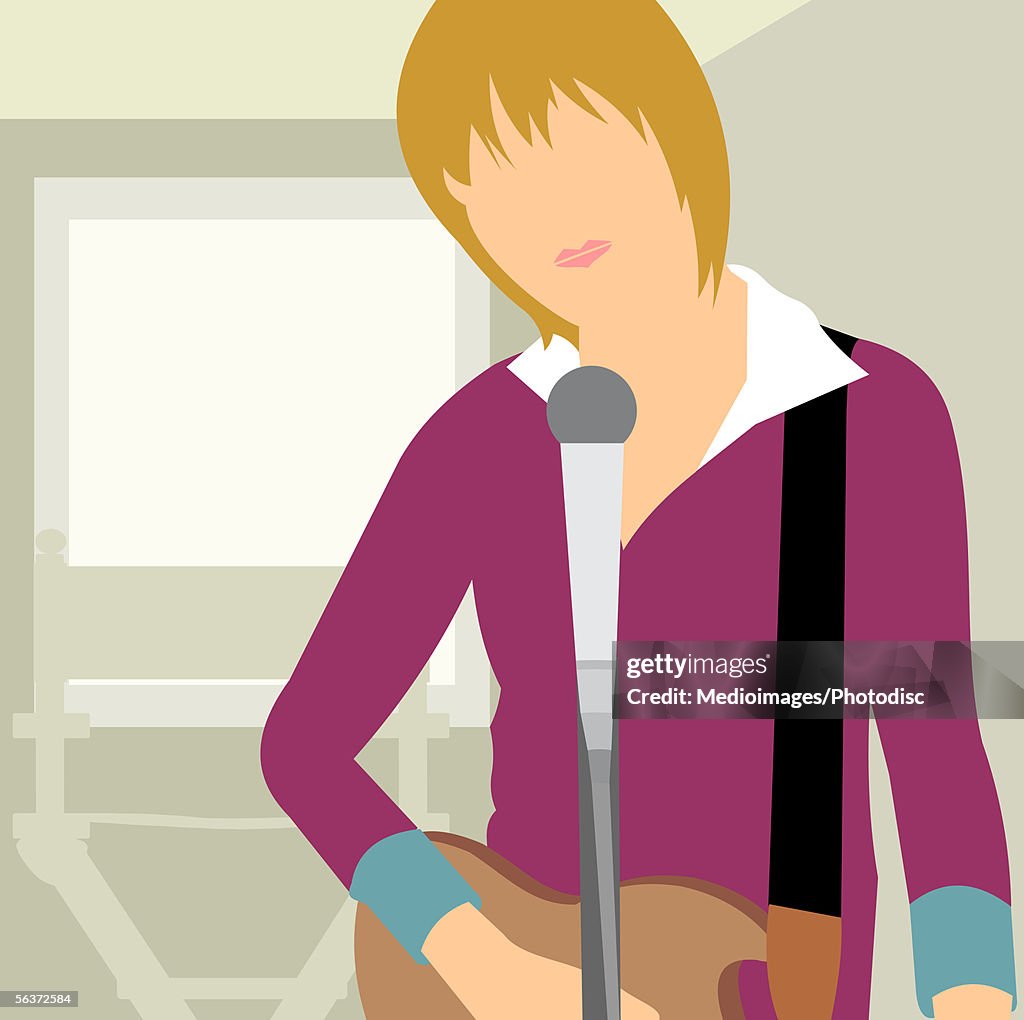 Portrait of a woman holding a guitar