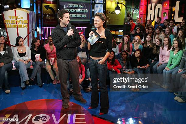 Actor Luke Wilson appears onstage with VJ Vanessa Minnillo during "Movie Week" on MTV's Total Request Live at the MTV Times Square Studios December...