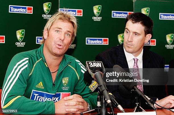 Shane Warne of Australia answers questions from the press as Cricket Australia Chief Executive Officer James Sutherland looks on during a press...