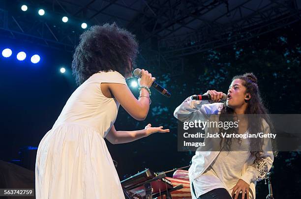 French-Cuban musicians, and twin sisters, Lisa-Kainde Diaz and Naomi Diaz perform as the duo Ibeyi onstage at Central Park SummerStage, New York, New...