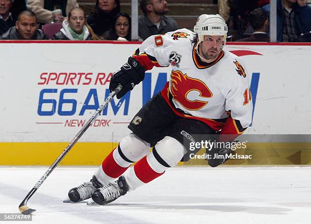 Tony Amonte of the Calgary Flames skates against the New Jersey Devils during their game on December 7, 2005 at Continental Airlines Arena in East...