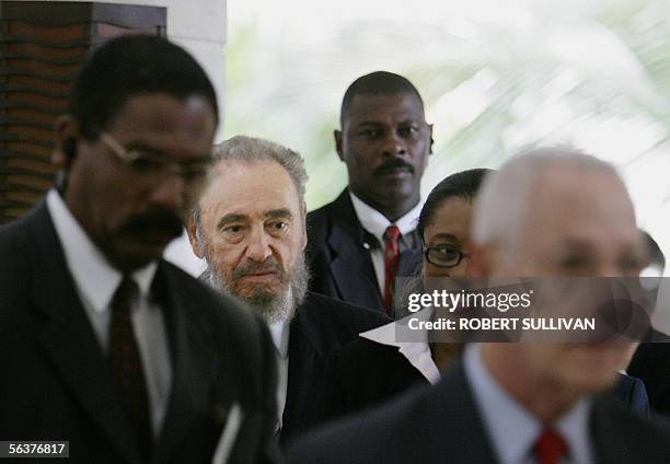 President Fidel Castro of Cuba is surrounded by security as he arrives for the opening session of the CARICOM-Cuba Summit in Bridgetown, Barbados 08...