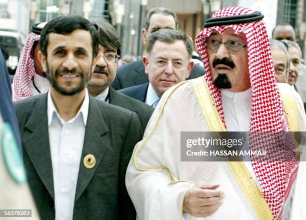 King Abdullah bin Abdul Aziz, Lebanese Prime Minister Fouad Siniora and Iranian President Mahmoud Ahmadinejad circumambulate around the Kaaba on the...