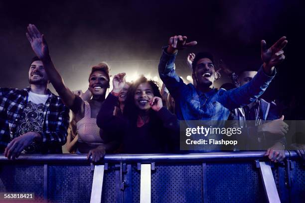 crowd of people at music concert - celebrating the songs voice of gregg allman backstage audience stockfoto's en -beelden