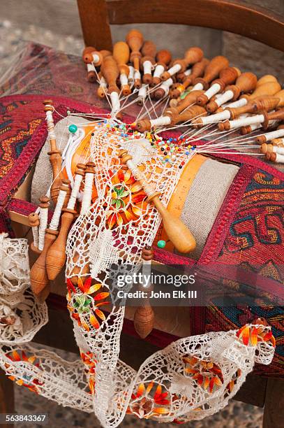 lace-making spools - lacemaking stock pictures, royalty-free photos & images