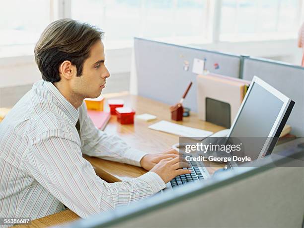 Man Working In Cubicle 3,445 Man Cubicle 30s Stock Photos, High-Res Pictures, and Images ...