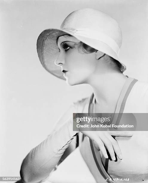 Portrait of actress Lili Damita wearing a cloche hat, for Samuel Goldwyn Films, 1929.