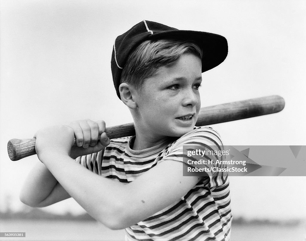 1930s BOY AT BAT WEARING A...