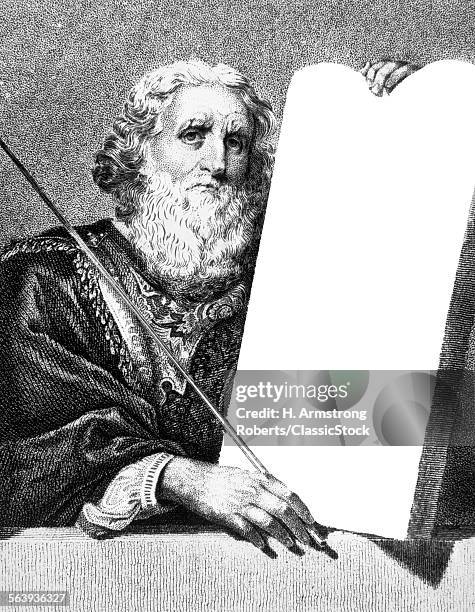 ENGRAVING OF MOSES HOLDING STONE TABLET