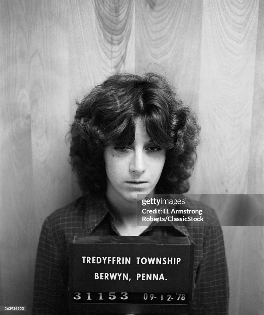 1970s MUG SHOT WOMAN BEING...