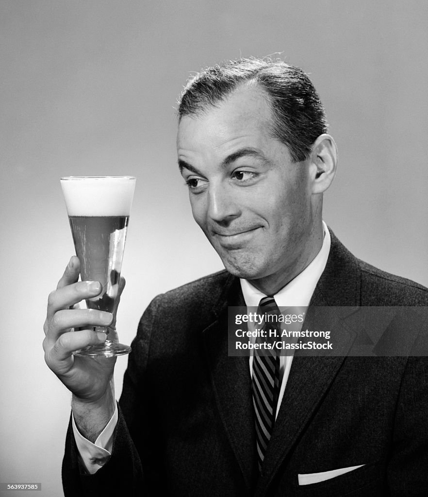 1960s SMILING MAN IN SUIT...