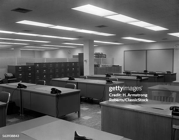 1950s 1960s OFFICE WITH DESKS BLACK PHONES AND FILE CABINETS