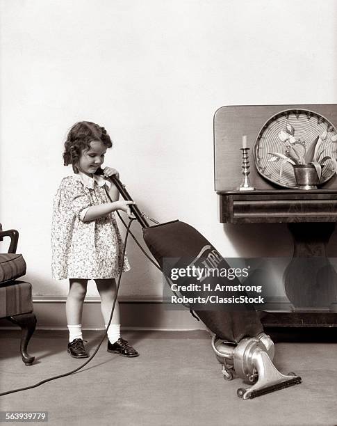 1930s LITTLE GIRL VACUUMING WITH EUREKA ELECTRIC VACUUM CLEANER