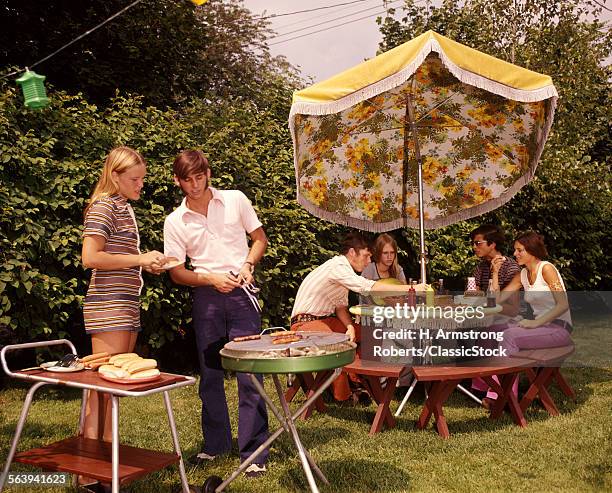 1970s GROUP TEENAGERS BOYS GIRLS BACKYARD GRILLING TABLE UMBRELLA