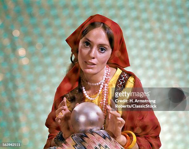 1970s GYPSY WOMAN FORTUNETELLER FORTUNE TELLER HANDS OVER CRYSTAL BALL PREDICTION FUTURE