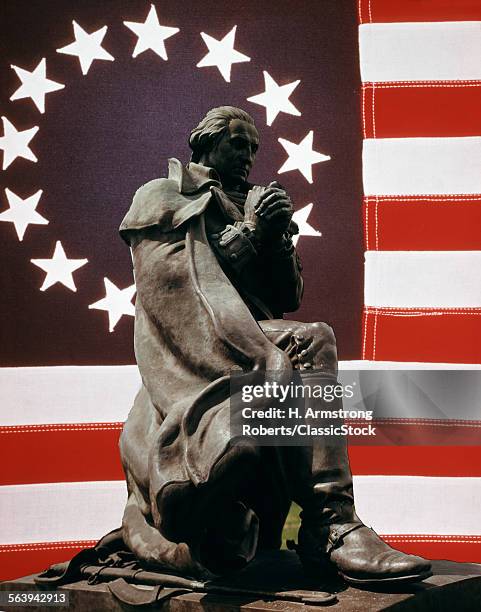 1970s COMPOSITE OF COLONIAL 1776 AMERICAN FLAG BEHIND STATUE OF GEORGE WASHINGTON