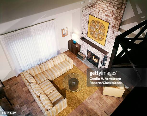 1980s INTERIOR FAMILY ROOM VIEW FROM ABOVE IN LOFT