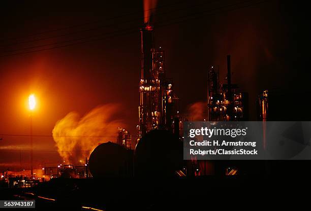 OIL REFINERY AT NIGHT