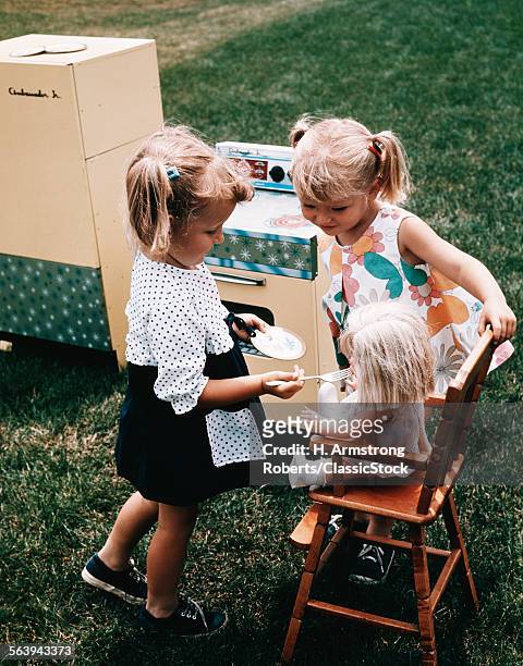 1960s TWO LITTLE GIRLS PLAYING TOGETHER FEEDING DOLL TOY STOVE REFRIGERATOR IN BACKYARD
