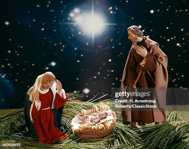 1980s NATIVITY SCENE BABY JESUS MARY JOSEPH FIGURINES AND STARS CHRISTMAS STILL LIFE