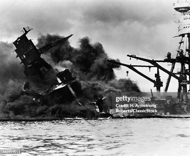 1940s DECEMBER 7 1941 DAY OF INFAMY BATTLESHIP USS ARIZONA IN PEARL HARBOR HI AFTER SURPRISE ATTACK BY JAPANESE AIR FORCES