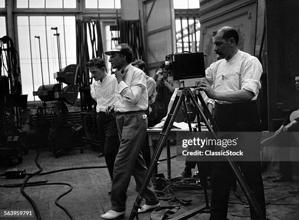 1910s SUMMER 1916 TRAVERS VALE DIRECTING RUSSIAN SILENT MOTION PICTURE AT BRADY STUDIO CONVERTED GREENHOUSE ROOF FORT LEE NJ