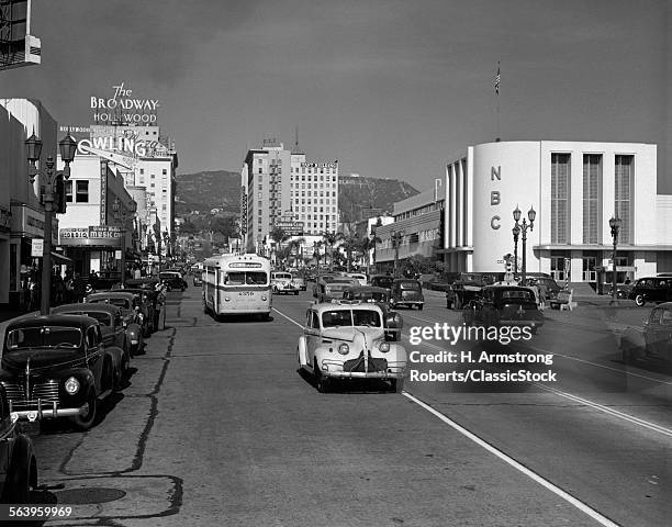 1940s STREET SCENE CARS BUS VIEW DOWN VINE STREET NEAR SUNSET BOULEVARD HOLLYWOOD LOS ANGELES NBC STUDIO THE BROADWAY HOTEL