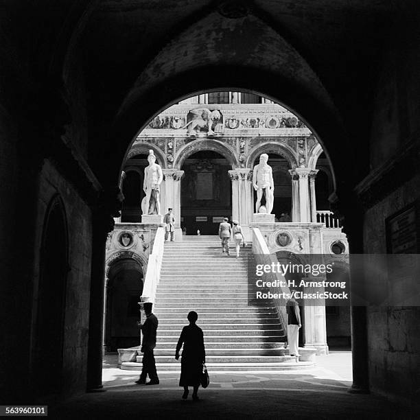 1930s 1940s VENICE ITALY DOGES PALACE VIEW THROUGH ARCHWAY TO STAIRCASE WITH STATUES OF NEPTUNE AND MARS