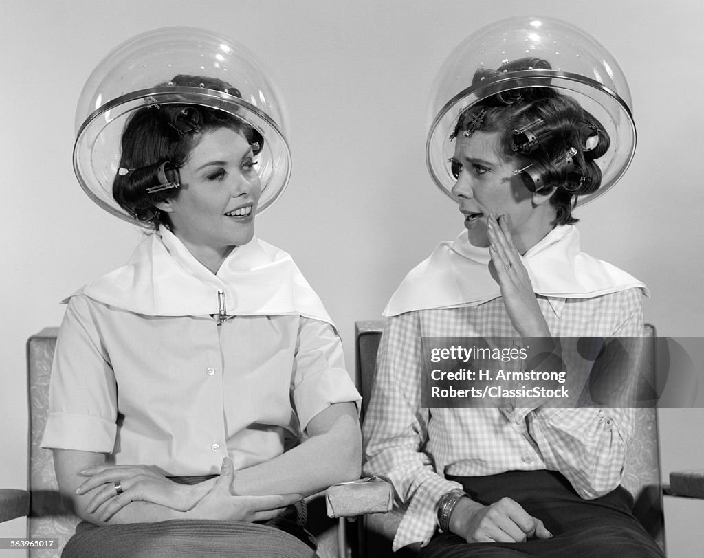 1960s TWO WOMEN SITTING...