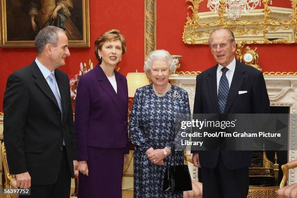 Queen Elizabeth II and Prince Philip, Duke of Edinburgh meet Irish President Mary McAleese and her husband Dr Martin McAleese at Hillsborough Castle...