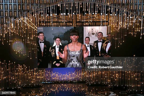 February 24, 2013 First Lady Michelle Obama greets the audience and read teh winner for Best Picture during the show of the 85th Annual Academy...