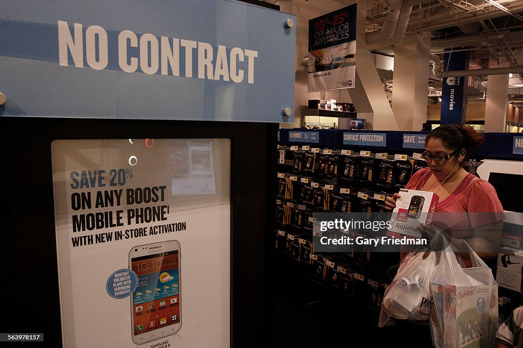 Adriana Valasquez shops for a pre-paid, no-contract cell phone at Best Buy in Culver City on Februa